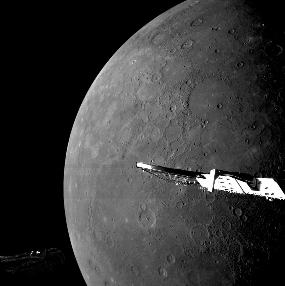 Part of spacecraft with Mercury close in background.