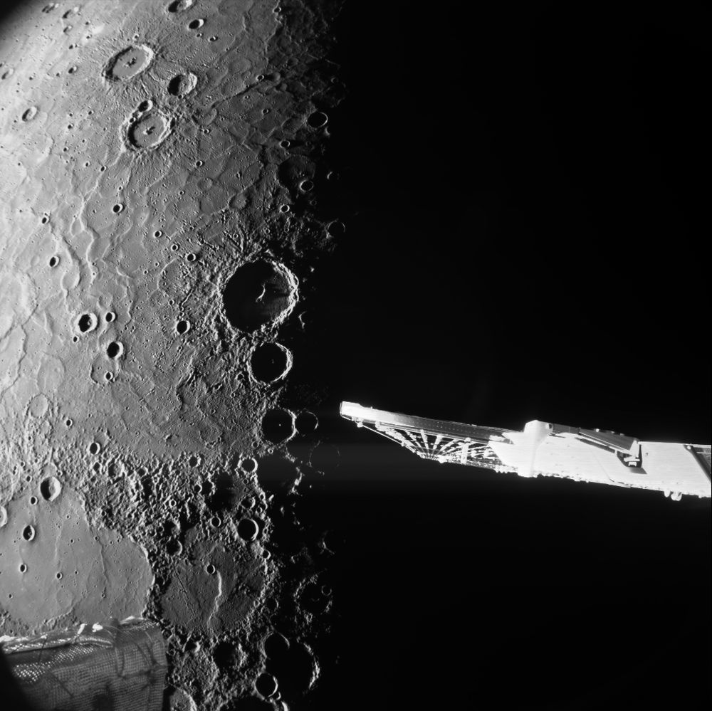 Part of spacecraft with Mercury close in background.