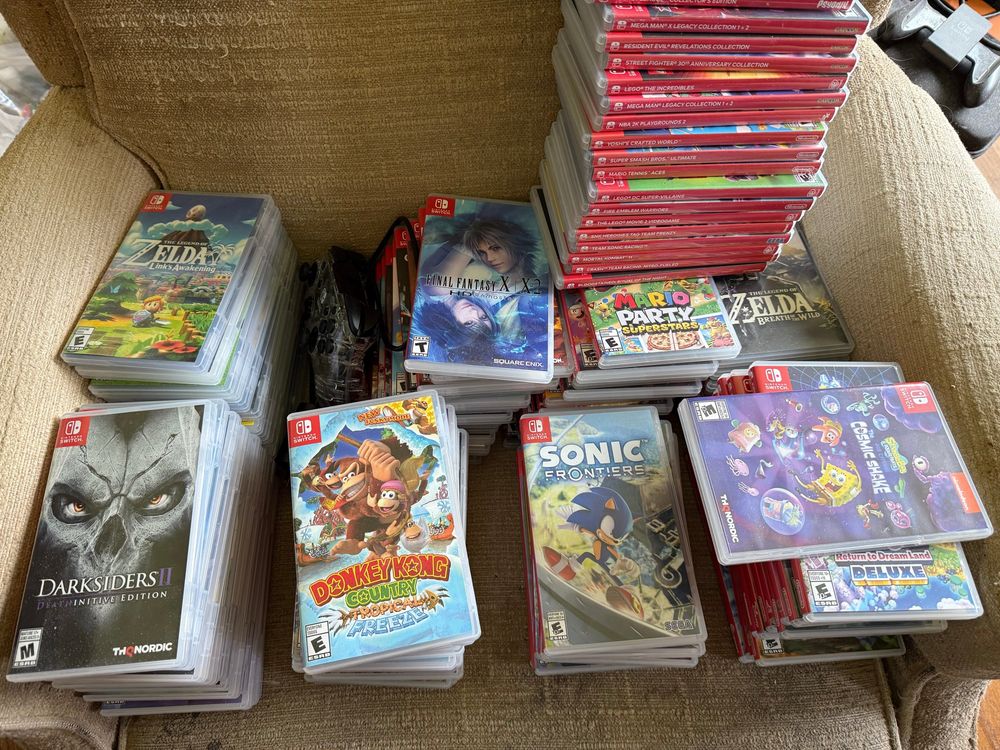 Stacks of Nintendo Switch games.