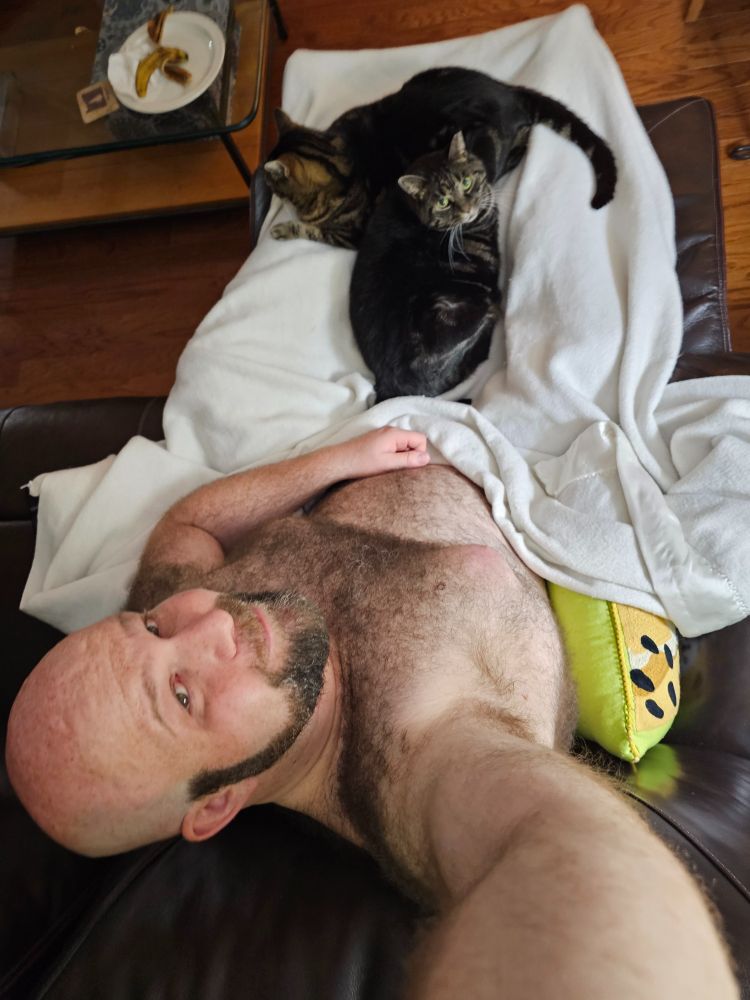 Half naked Jeremy with Bert & Ernie (the cats)