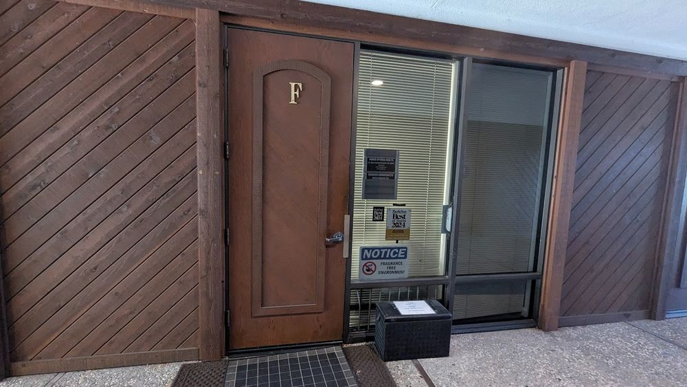 outside the doorway to my office, suite f.