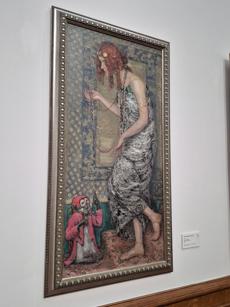 A painting of a redhead woman in an orientalist style, with a money