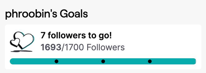 A screenshot, taken from Roo's twitch page. It shows a teal progress bar for their next follower milestone, under the heading 'phroobin's Goals'. The bar is labelled as '7 followers to go!' with the words '1693/1700 Followers' underneath. Beside the text are two hearts, and the goal bar sits underneath everything.