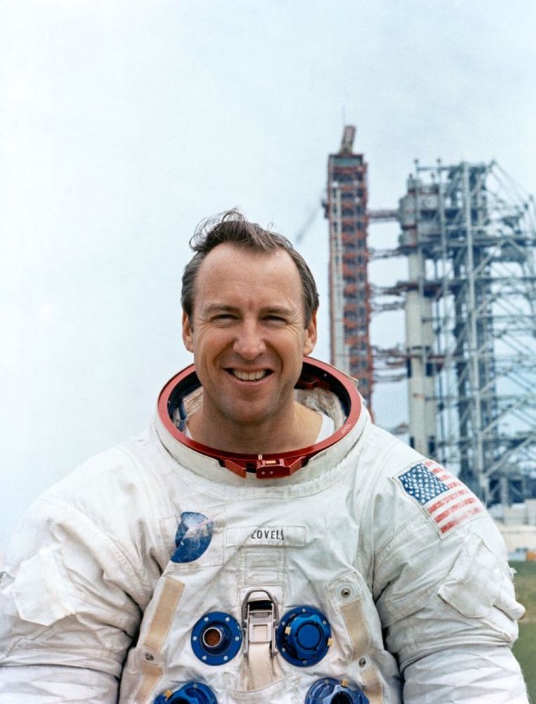 Smiling man in space suit