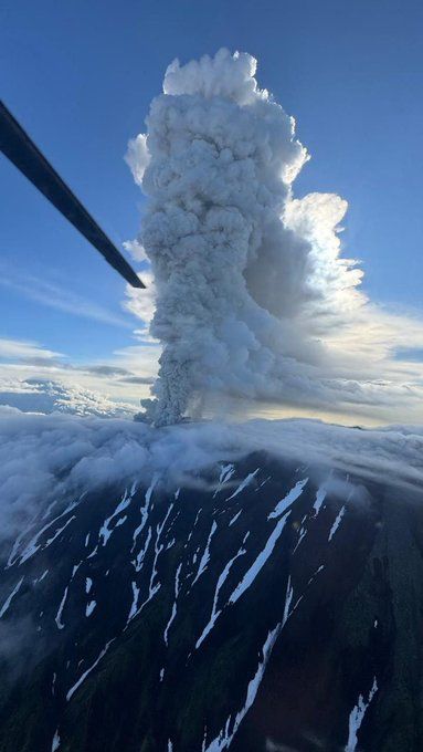 Plume of smoke rises from a volcano 