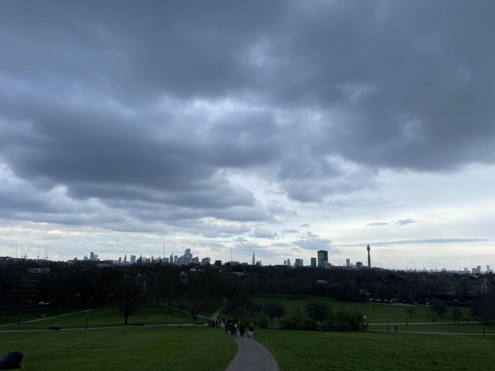 Heavy thunderclouds over the London skyline as viewed from Primrose Hill in the late afternoon 