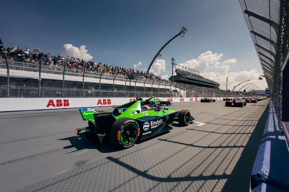 Both Envision Racing cars lineup on the starting grid just before lights out for the São Paulo ePrix in Season 10 of the FIA Formula E World Championship. 