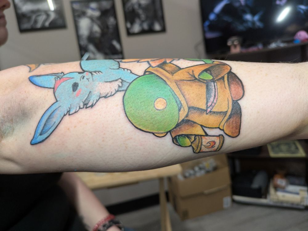 A blue carbuncle and a tonberry next to the stack of other characters.