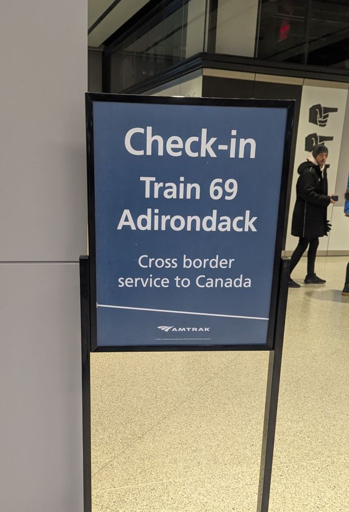 A check-in sign for Amtrak route 69 