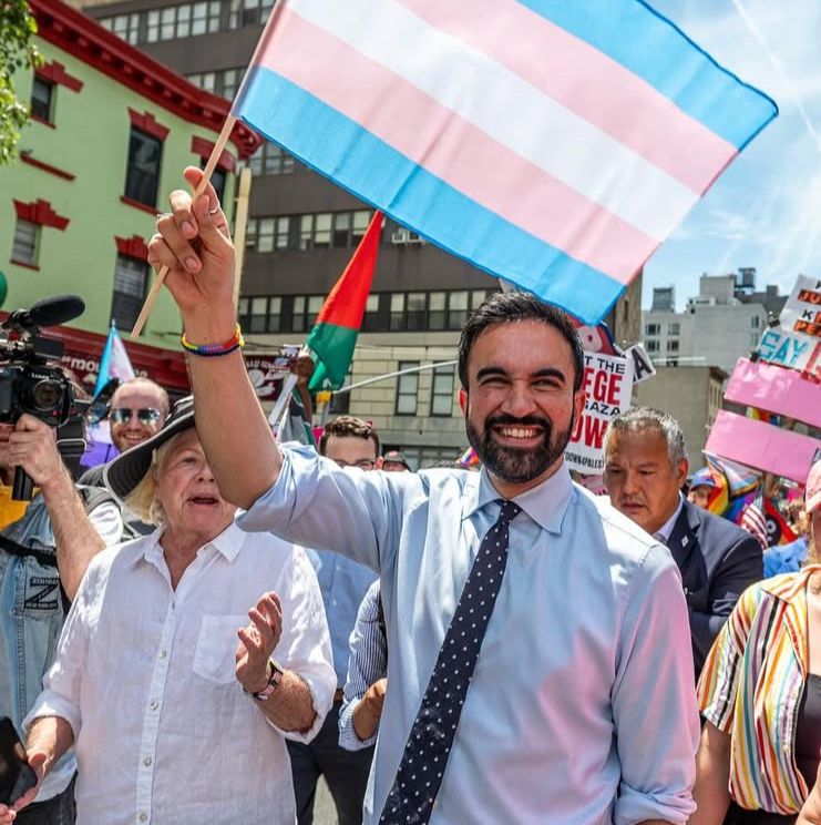 Zohran Mamdani waving the trans flag at NYC Pride 