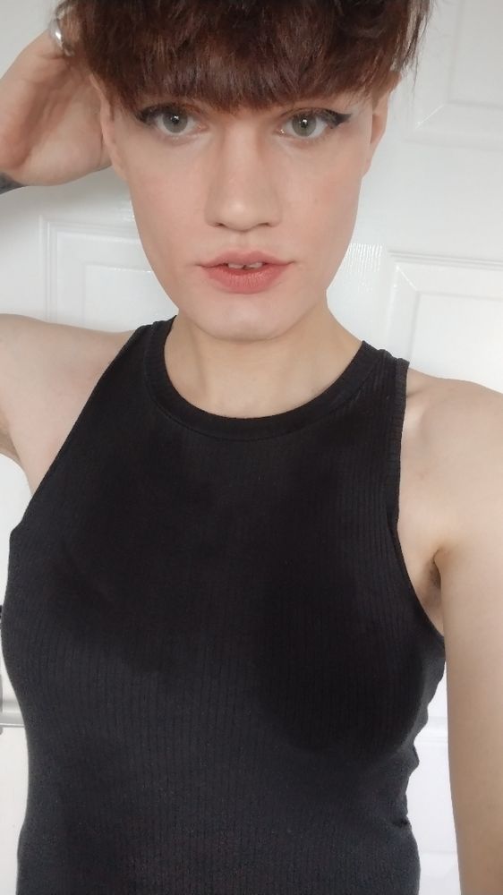 A picture of a woman in a black dress