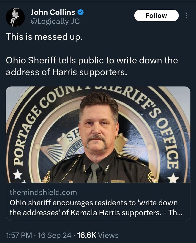 Photo of Ohio Sheriff with mustache in front of Portage County Sheriff Office Seal