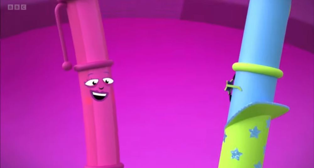These are two pens having fun and singing. The pink pen is “Alphablock I” after she transformed into a pen, and the blue pen with a green suit is “Ben the pen”.