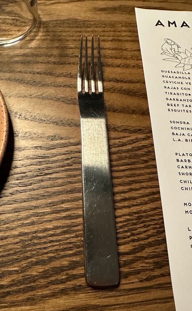 The most autism ass fork you have seen. It is all the same width with tines on one end and a little bend. I hate it so much.
