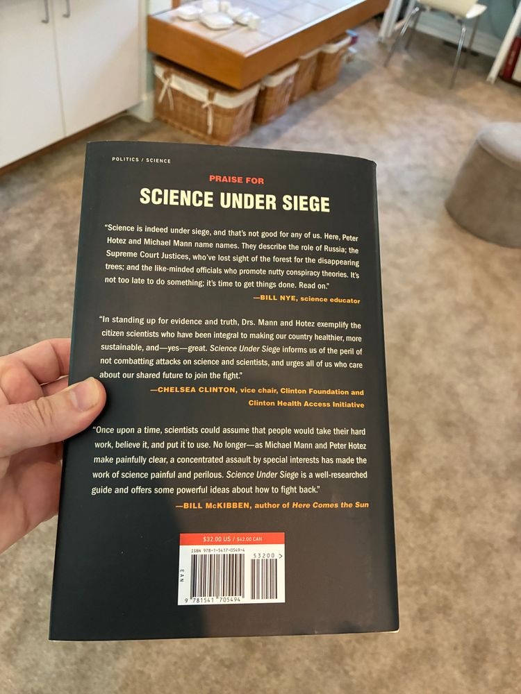 back cover of 'science under siege"