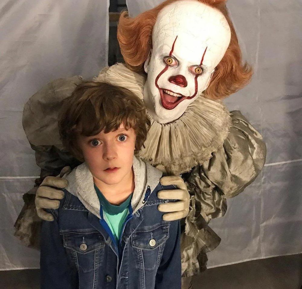 Pennywise posing playfully with that really cute little boy he ate in the movie. 