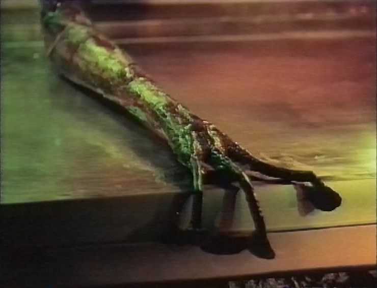 The grasping hand of a dying Martian from 1953's film War of The Worlds
