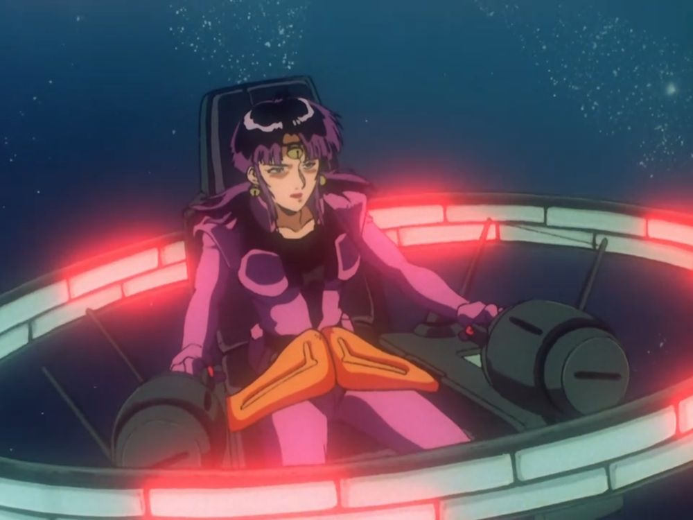PINK HAIRED WOMAN WITH BELLS ON HER HEAD IN AN EVIL MOBILE SUIT