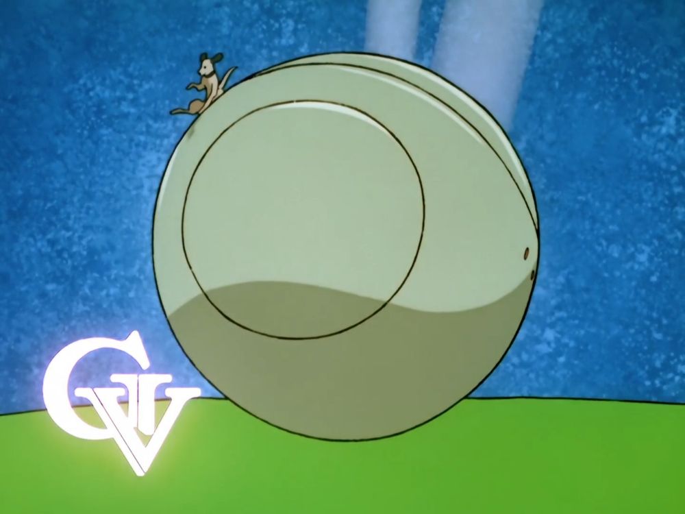 Victory 21 eye catch, showing the dog, flanders, as tiny. atop a large orb-like robot named haro. flanders is beginning to fall off the side