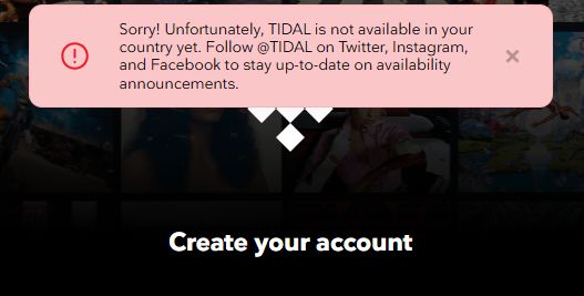 Screen shot with a red warning pop up stating: "Sorry! Unfortunately TIDAL is not available in your country yet."