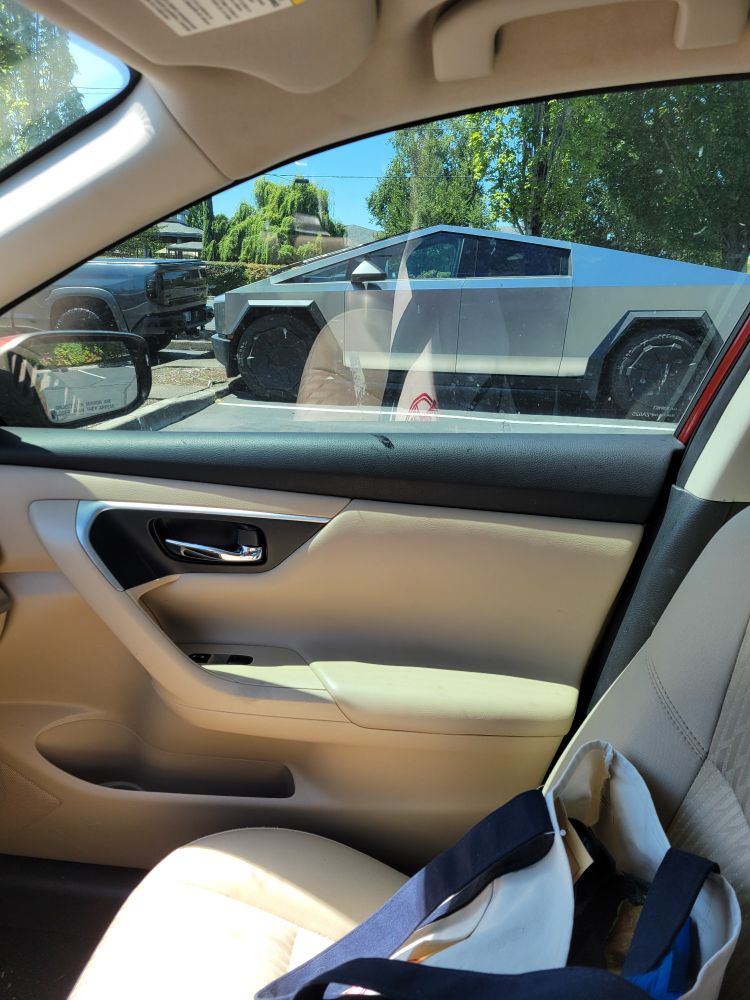 Some dumpster on wheels. I think it called a cyber truck. Nasty. 