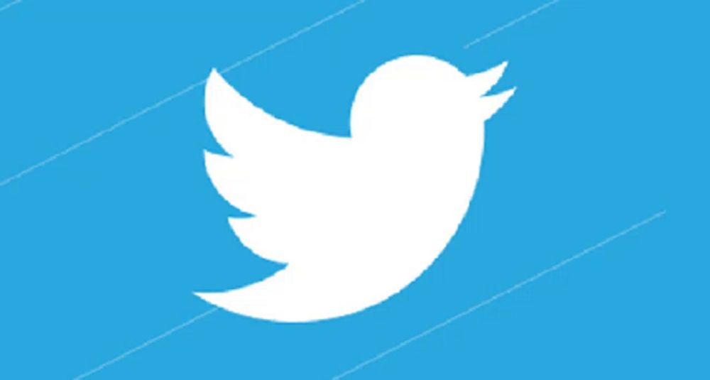 a twitter logo on a blue background with lines