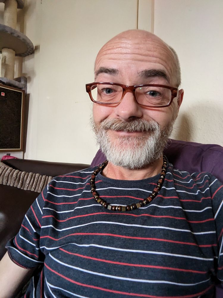 A resigned looking but still chilled old man