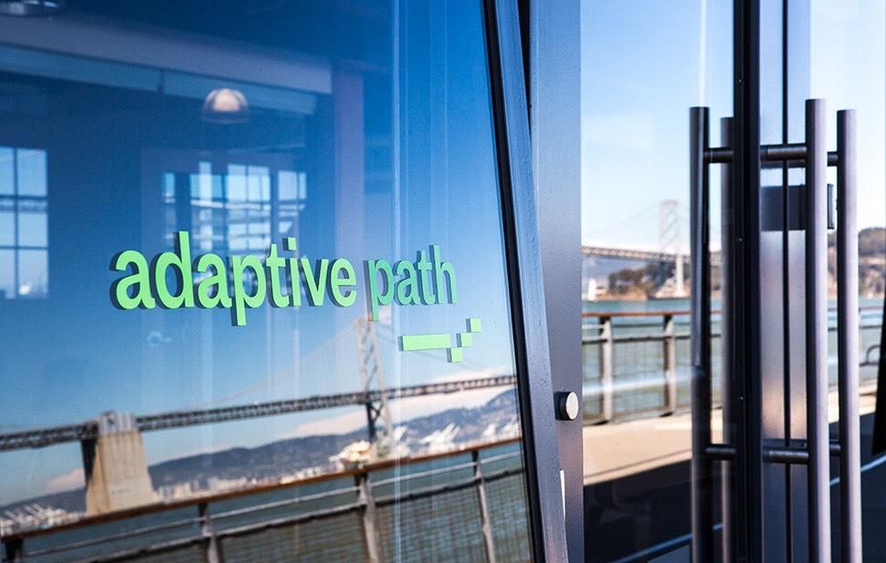 The San Francisco Bay reflected in the front window of Adaptive Path.