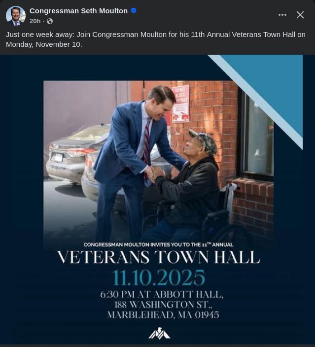 A facebook post screenshot. Seth Moulton in a blue suit and striped tie appears to be clasping the hand of a man in a wheelchair near a brick building. Two cars are in the background, and one has a faint aura around it that might be AI slop. The text reads: "Just one week away: Join Congressman Moulton for his 11th Annual Veterans Town Hall on Monday, November 10." 