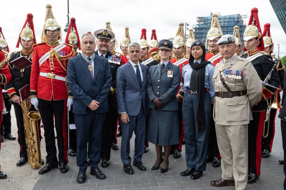 Group of people in armed forces regalia 