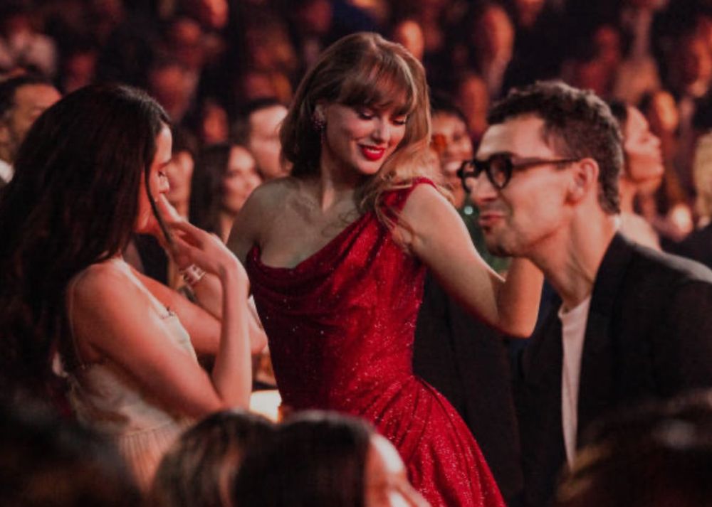 Margaret Qualley, Jack Antonoff, and Taylor Swift dancing at the Grammys