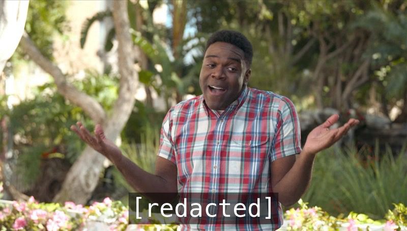Sam Richardson shrugging and looking sheepishly to his left. He’s standing outside in a park and wearing a plait shirt sleeved button down shirt.

At this point in the sketch he’s talking about Toilet Truck and Baby Duff.