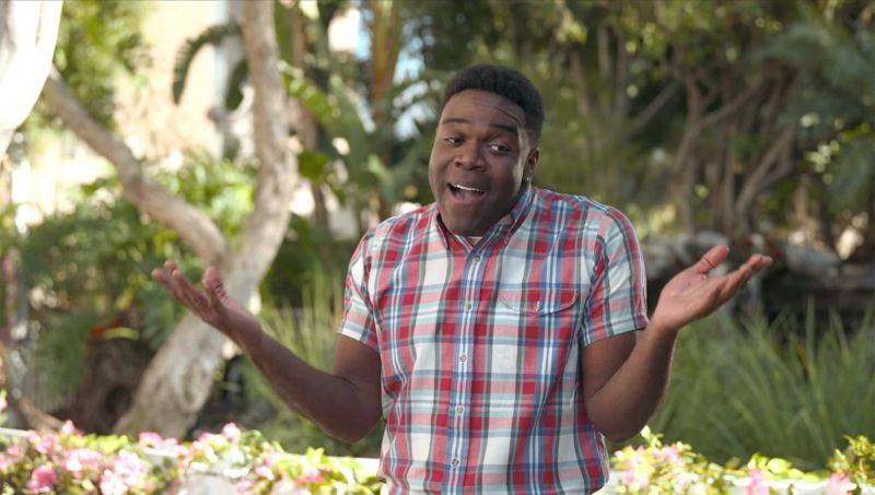 Sam Richardson shrugging and looking sheepishly to his left. He’s standing outside in a park and wearing a plait shirt sleeved button down shirt.

At this point in the sketch he’s saying “The worst is Toilet Truck and Baby Duff. I hope Toilet Truck dies. I honestly hope he dies. I hope Toilet Truck dies. I hope Baby Duff dies. I hope somebody finds them and kills them”
