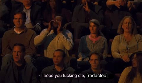 A man in the crowd of the Baby of the Year contest in ITYSL, yelling “I hope you fucking die, [redacted].” In the actual show, the “redacted” is “Harley Jarvis”