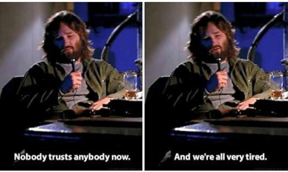 Screenshots from John Carpenter’s The Thing showing MacReady sitting at a desk with a scotch and a tape recorder saying “Nobody trusts anybody now. And we’re all very tired.”