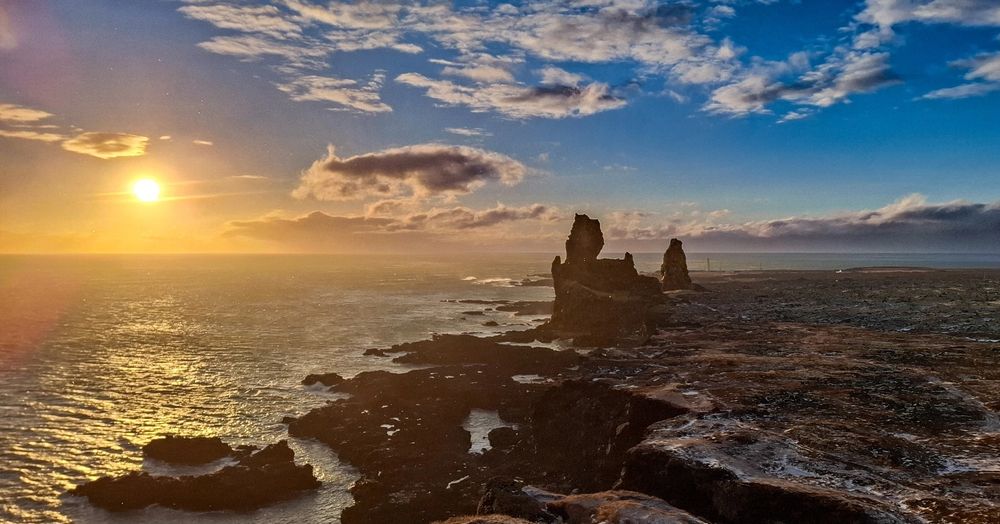 Rugged coastline at sunset. Lóndrangar, Iceland.