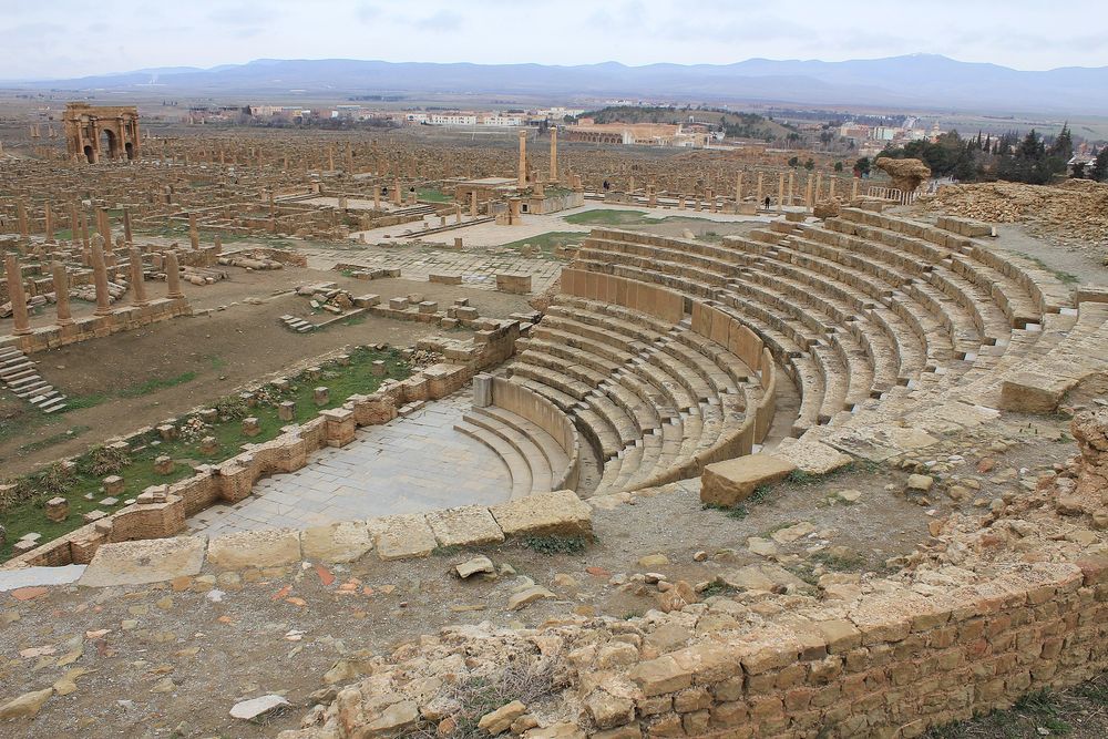 Different views of Timgad, with close ups of the latrines, the theatre and a colonnade