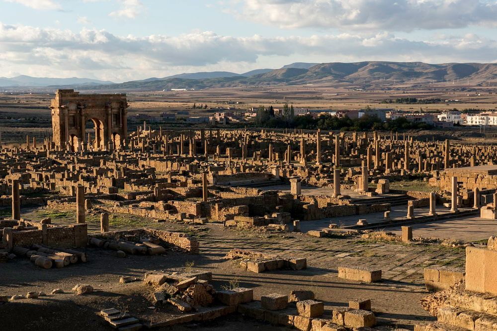 Different views of Timgad, with close ups of the latrines, the theatre and a colonnade