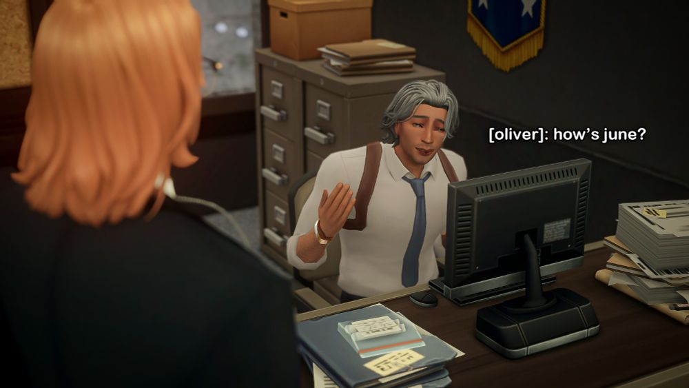 a grey haired man in his 30's is sitting on a office desk at a police station, he's a detective, his name is oliver. he's talking with his co-worker malcolm.

[oliver]: how's june?