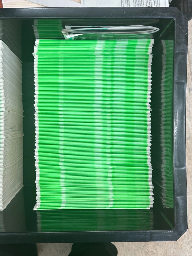 Folded and printed sheets in Fluo-green Riso