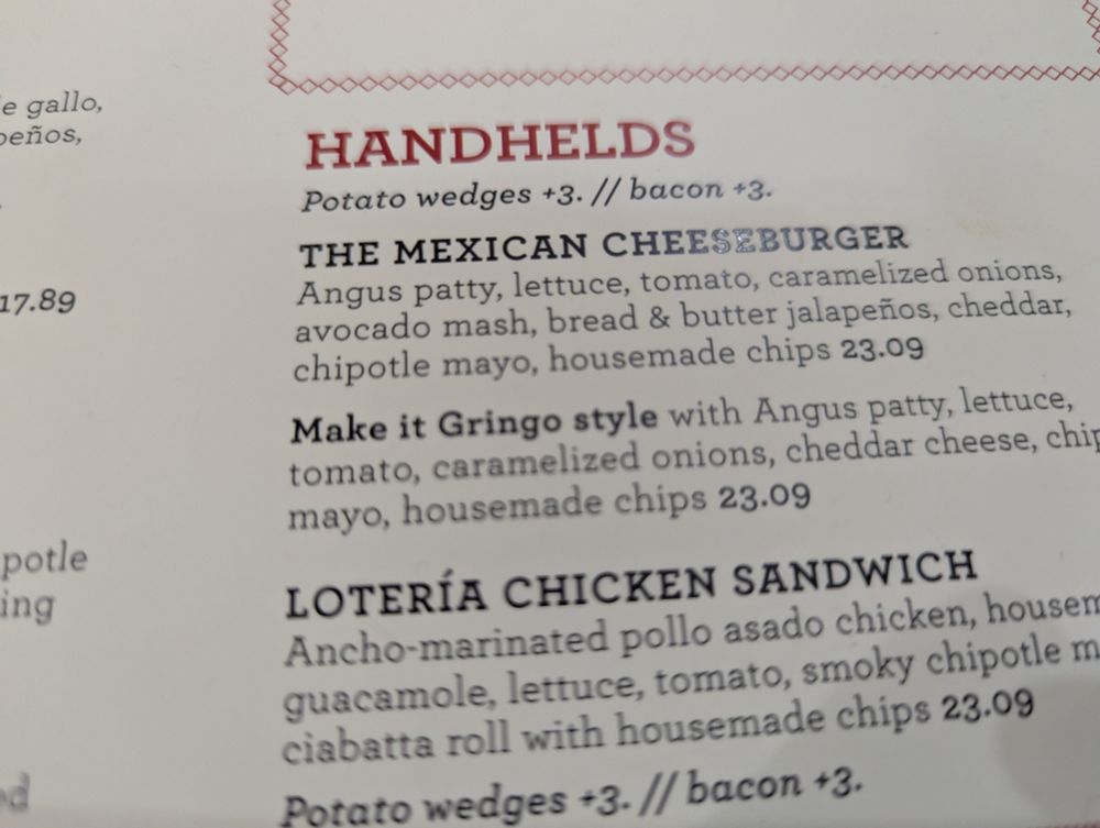 A menu showing an option of a "Mexican cheeseburger" with the option to "make it gringo style" removing the avocado mash, and jalapenos