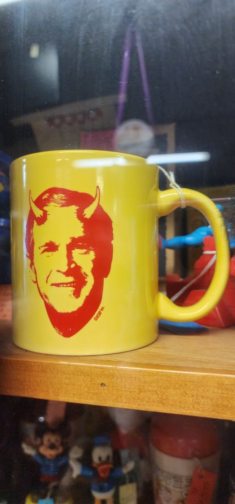 Coffee mug with George W. Bush with devil horns