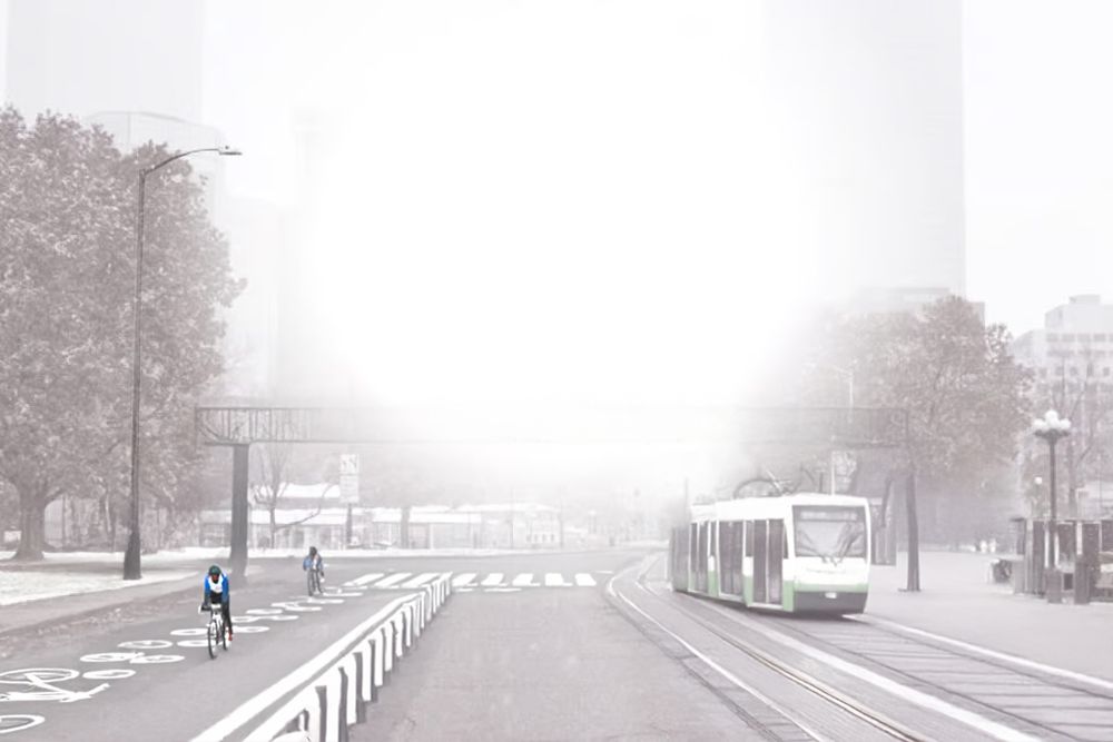 AI-generated image of Broadway in Denver with an added tram, added  bike lane, and a raised crosswalk.