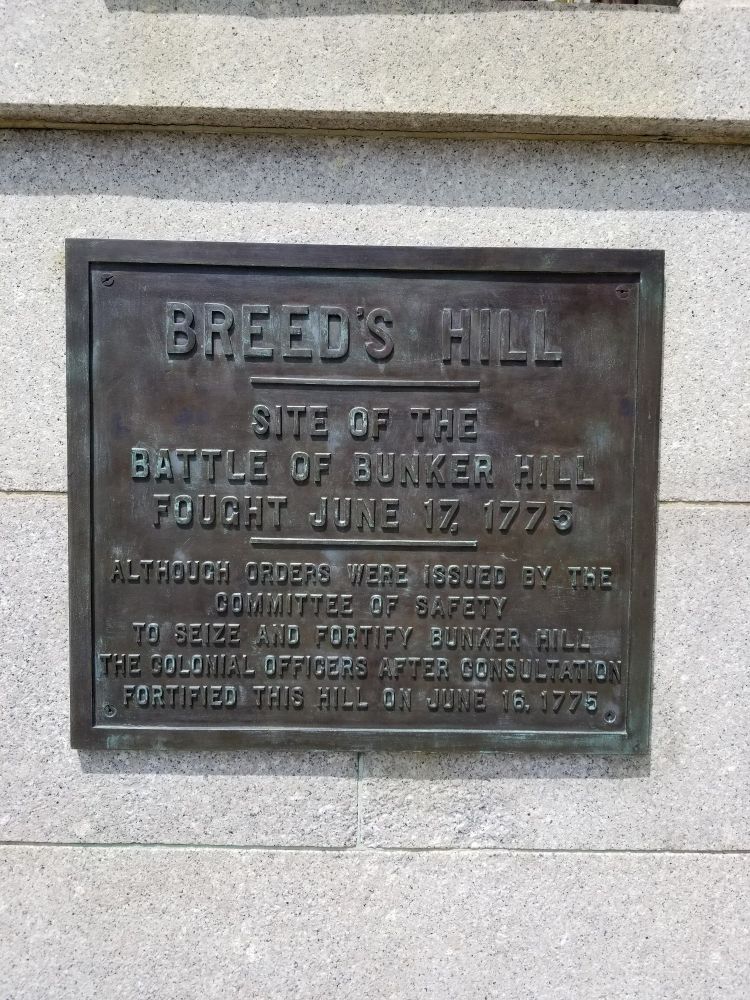 This plaque, affixed to the Bunker Hill National Historical Monument, reads:
Breed's Hill
Site of the battle of Bunker Hill
Fought June 17, 1775
Although orders were issued by the Committee of Safery
To seize and fortify Bunker Hill
The colonial officers after consultation
Fortified this hill on June 16, 1775