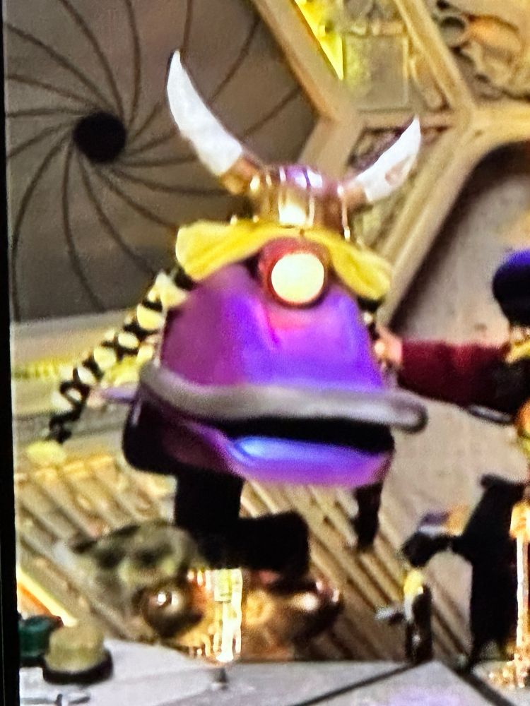 the robot “Gypsy” from mystery science theatre 3000 wearing a Viking helmet and long blonde wig