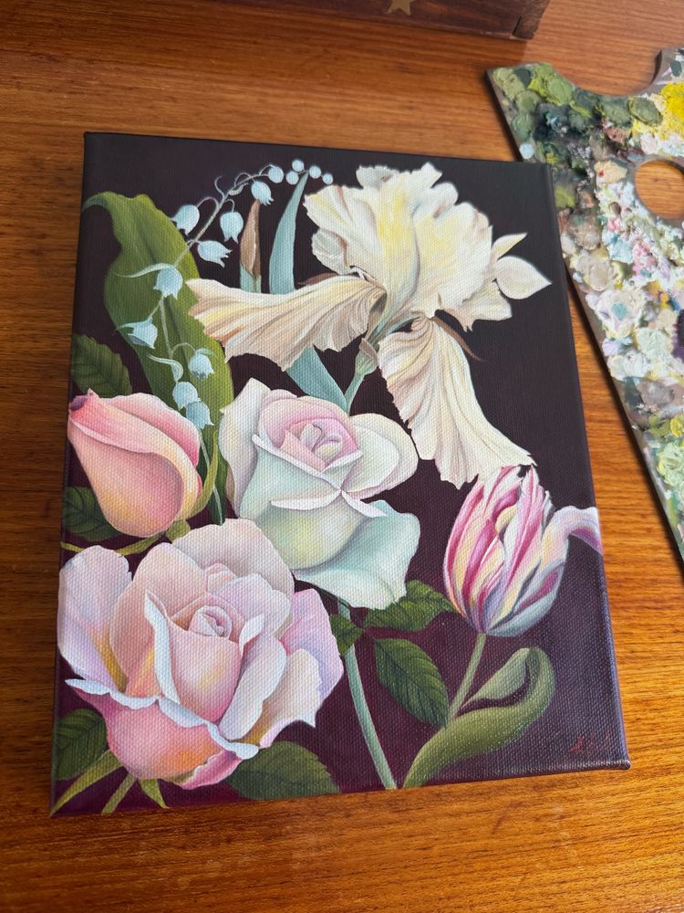 A small oil painting of an iris, a rose, a tulip and lily of the valley, with a deep burgundy background. 