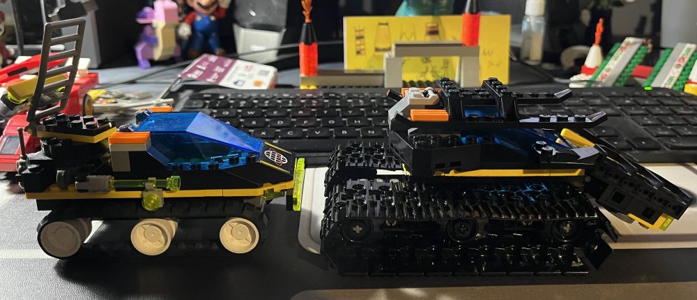 Side profile of Flex's ATV and a WIP MOC of its upgrade. I want to keep the visual identity the same, but more detailed and like an evolution of the original. So, I need to switch out those black wheels to white on the upgrade when I get the chance.