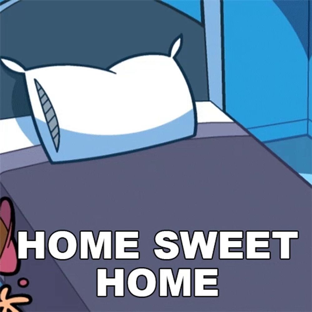 a bed with a pillow on it and the words home sweet home