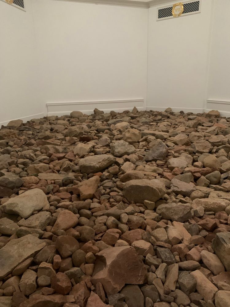 An art gallery space full of stones collected from grace yards in Dumfries and Galloway 