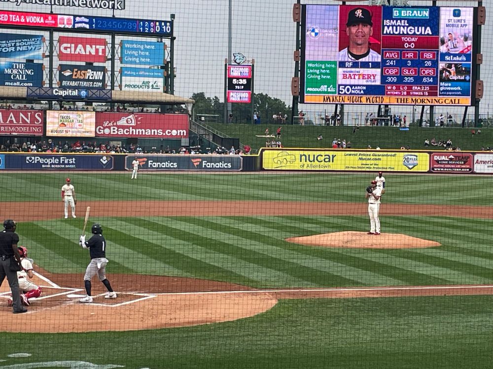 Shot of Aaron Nola pitching to Garrett Stubbs in the top of the second inning against the Scranton/Wilkes-Barre  RailRiders (aka the baby Yankees) at Coca-Cola Park in Allentown, PA. It is 75° and slightly hazy due to wildfire smoke. 